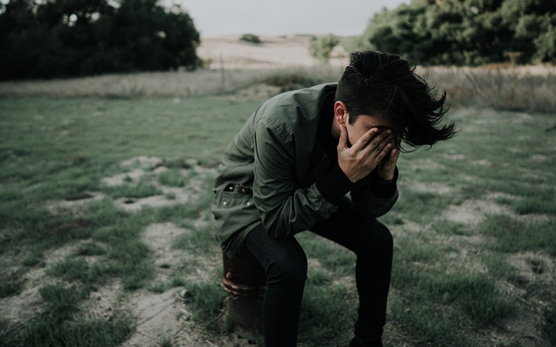 man suffering from headaches